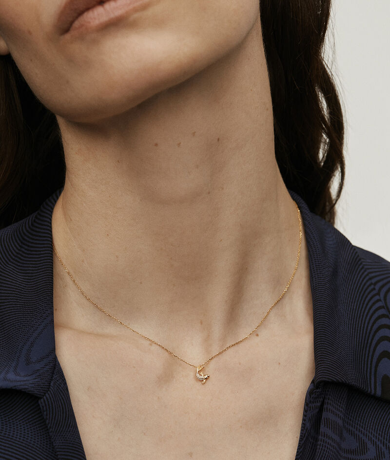 Colgante de oro amarillo de 18k con diamantes con forma de pez